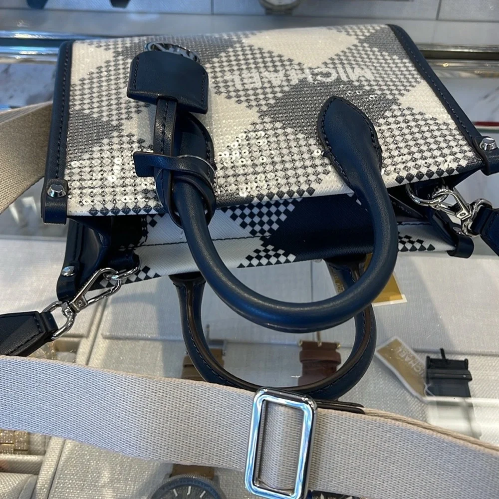 Michael Kors Mirella Extra-Small Logo Crossbody XBODY Shopper Bag
Navy
NWT
L - Picture 15 of 16